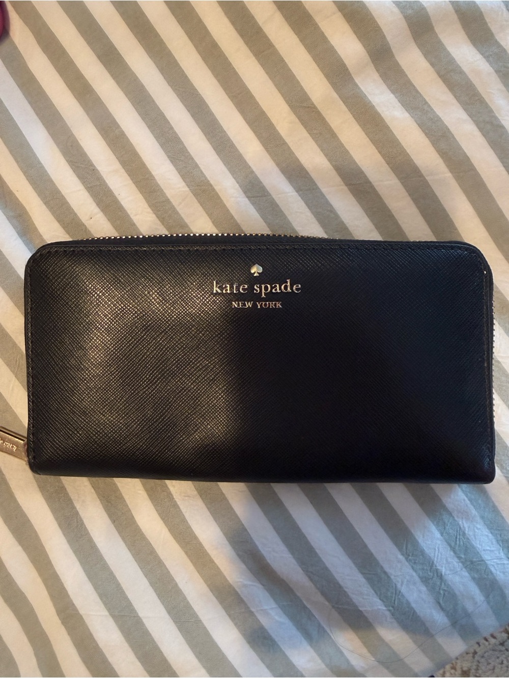 kate spade black zip-around continental wallet with gold logo